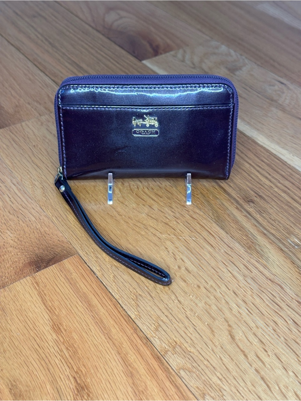 Coach Glossy Patent Leather Wristlet in Plum